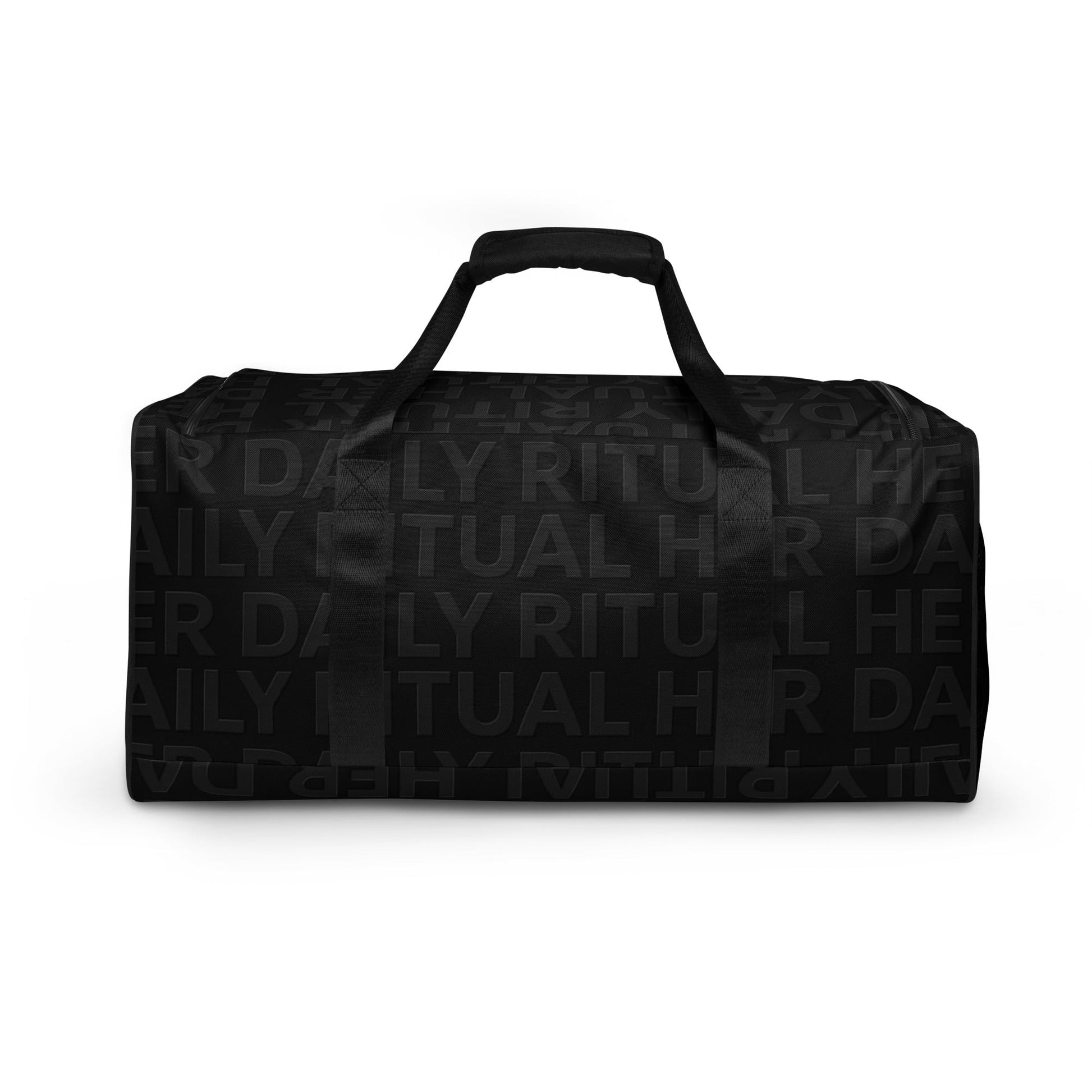Side view of Her Daily Ritual Duffle Bag – versatile and stylish black duffle with padded strap